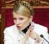 Ющенко "порвал" Тимошенко в европейских СМИ